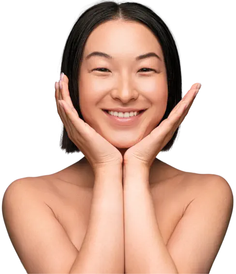 A lady holding her hands to her face with a huge smile